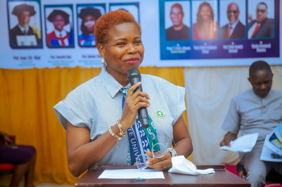 confident woman speaking at conference