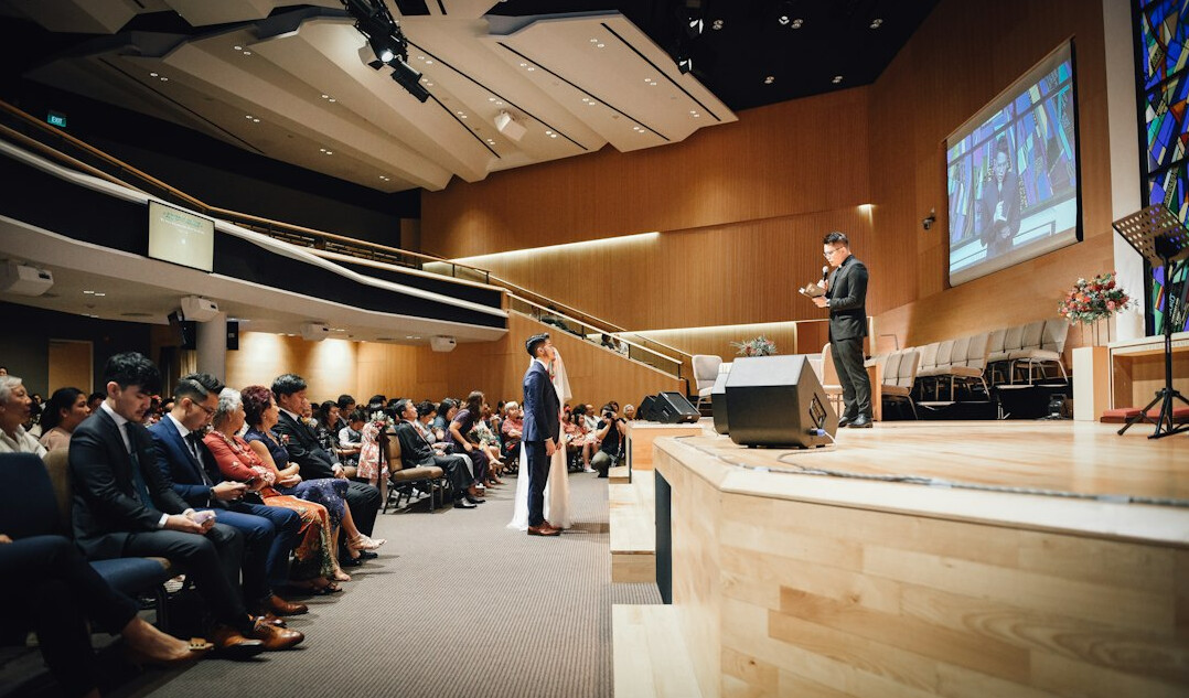 woman presenting in front of audience