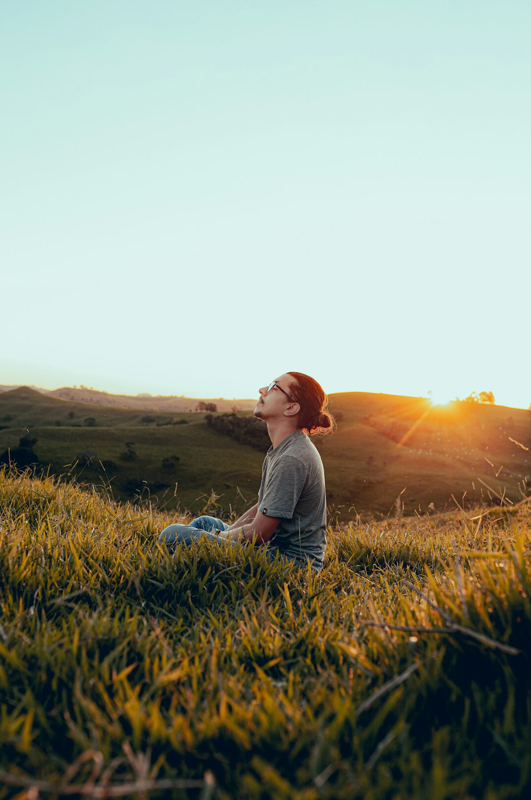 woman meditating outdoors