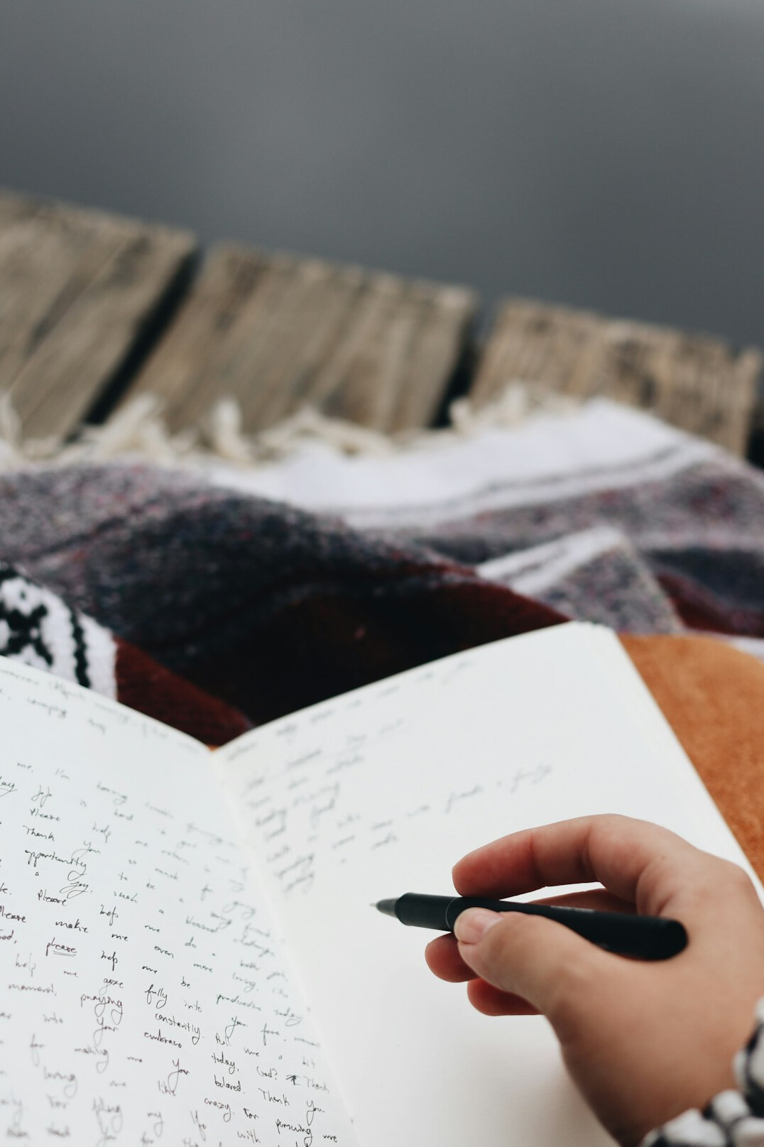 person journaling emotions